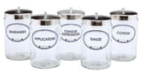 Graham Field Set of Five (5) 7"H X 4.25"D Labeled Flint Glass Sundry Jars with Covers (Labels: Bandages, Applicators, Gauze, Cotton, Tongue Depressors) ( Packaging - Each/ST of 5 )